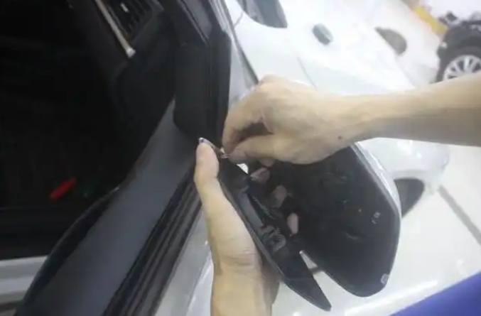 How do I put the rearview mirror back on if it falls off? How do I put the rearview mirror back on if it falls off?